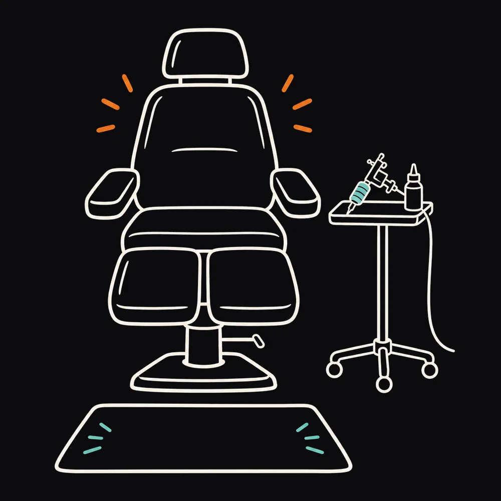 Line illustration of an empty tattoo chair beside a rolling table and a welcome mat
